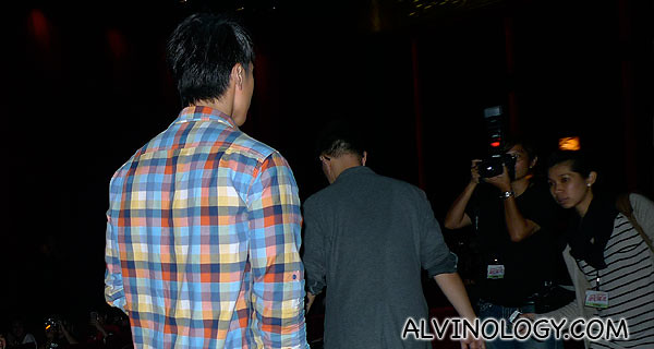 Wu Chun making his way to the front of the hall