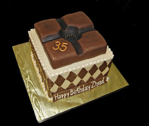 35th birthday cream brown and gold cigar themed cake