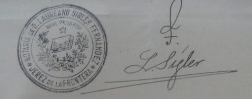 Firma y sello del notario Ángel Fernández Palomo