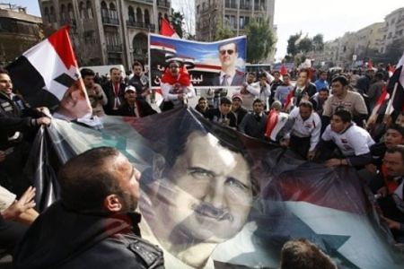 Supporters of Syrian leader Bashar al-Assad. The government has been under attack by the imperialist states. by Pan-African News Wire File Photos