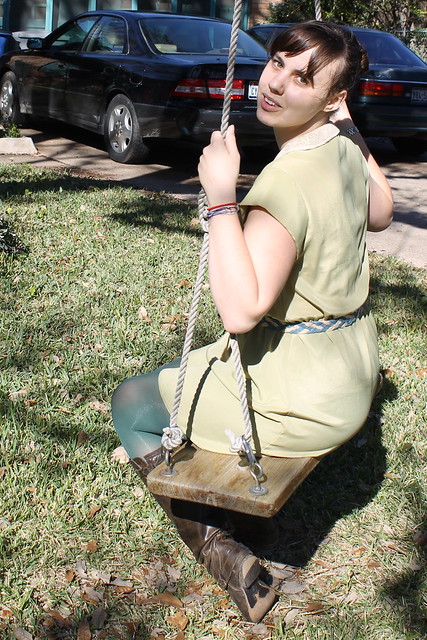Longhorn outfit: thrifted belt, urban outfitters dress with lace peter pan collar, green tights, leather boots, wooden board swing
