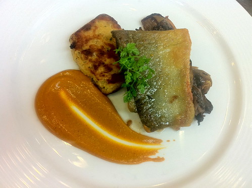 Pan-Seared Artic Char with grilled radicchio di Treviso, pancetta chickpea cake and sauce romesco