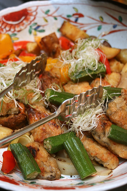 Oysters in batter, sauteed with vegetables