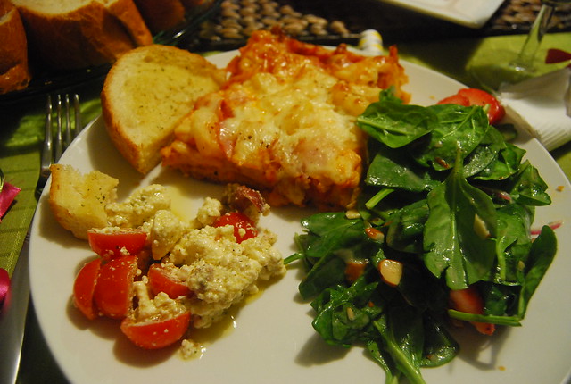 Pizza, salad, cheese & tomato...thing, bread.