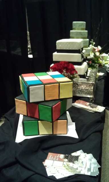 A Rubik's cube among wedding cakes