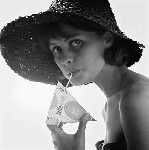 Tetra Pak - Girl in sun hat with Tetra Classic package, 1960s