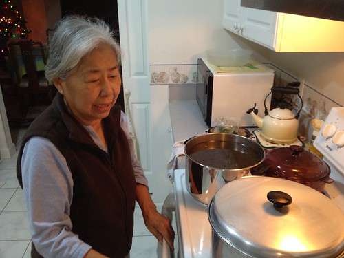 Mom overseeing the cooking of pho