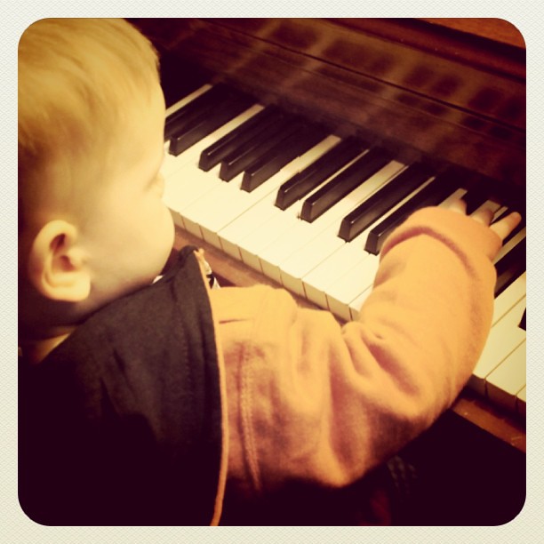 My cousin's baby playing around on the piano