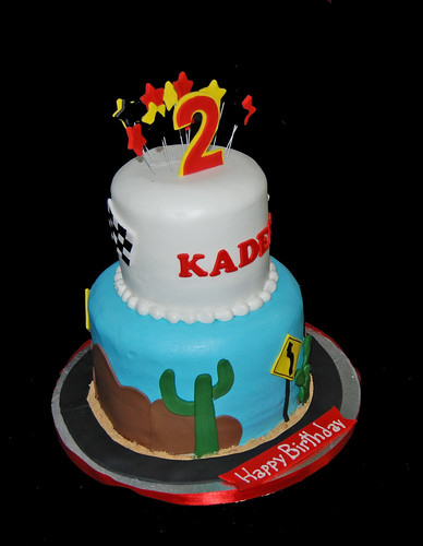 2 tier racecar themed birthday cake for a Cars themed birthday celebration