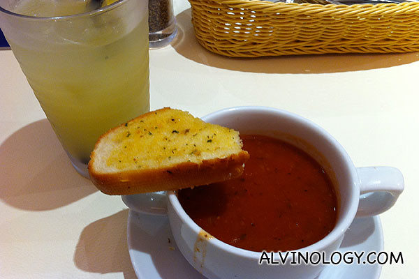 Soup, bread and drink that comes with the set menu