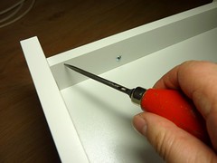 Use a bradawl to indent and mark the screwholes