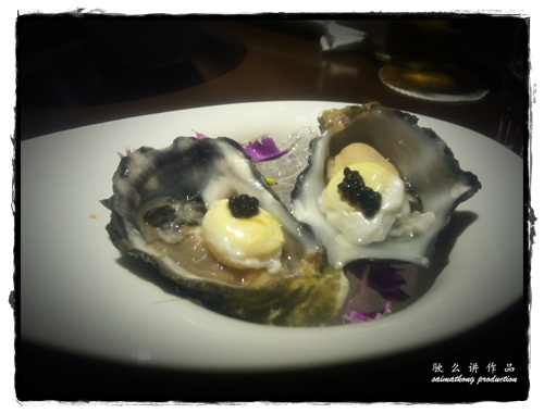 Coffin Bay oyster with poached quail egg and smoked caviar