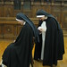 Sr. Mary Catharine adjusts Sister's veil