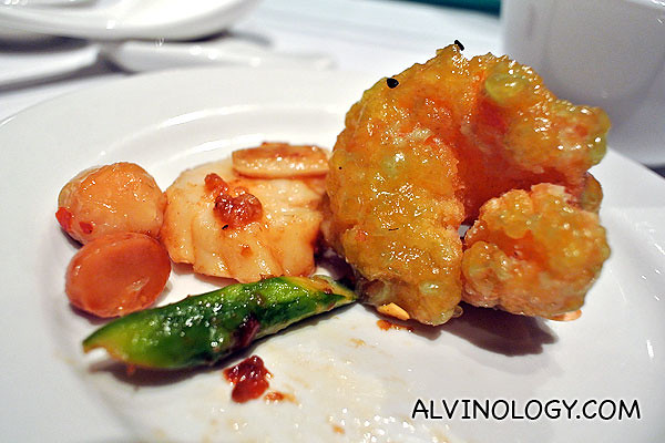 Individual portion of Min Jiang's almond prawn, served with scallop and macadamia nuts