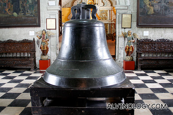 Large antique bell at the museum entrance
