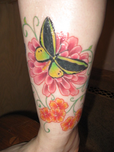 Butterfly and rose tattoos on leg Posted by Zaneta NL at 909 AM