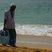 Local man selling masks on the beach