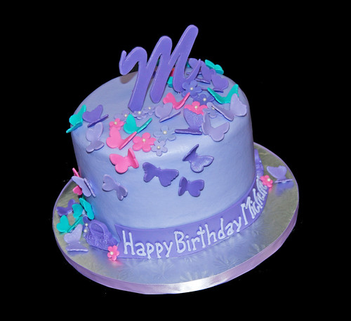 Puple pink and turquoise monogram birthday cake with butterflies