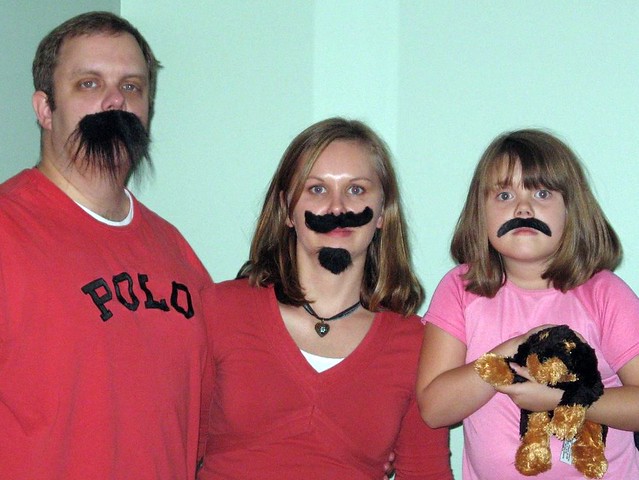 mustachioed trio