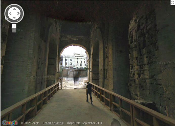 Lone_man_in_The_Colosseum,_Rome