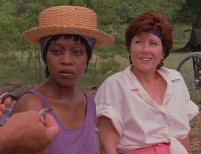 Alfre Woodard and Mary McDonnell in the film Passion Fish. They are sitting outside.