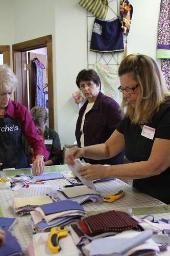 Project Linus Quilts Using recycled fabrics from Custom Executive Outfitters in Washington DC