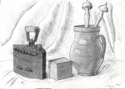Old pressing iron, cube, vase