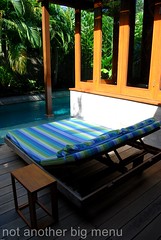 The Elysian, Bali - Deck chair by the pool
