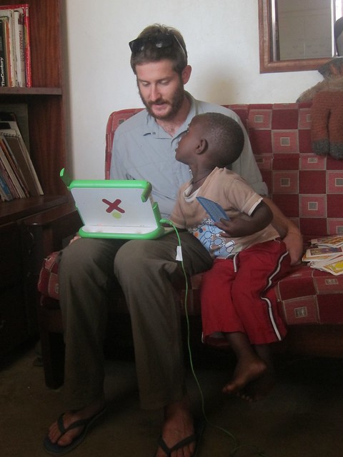 Nick and Prosper with an OLPC