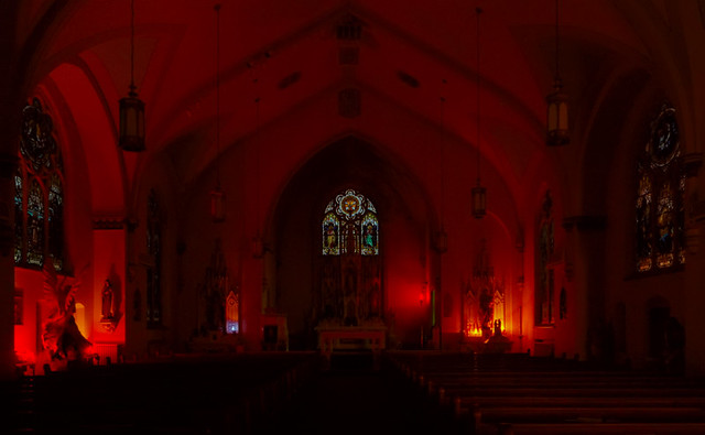 Saint Mary Roman Catholic Church, in Glasgow, Missouri, USA - interior by candlelight