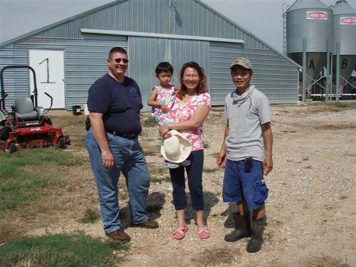 NRCS Supervisory District Conservationist Joe Addy worked with Diem Nguyen, her husband, John Pham, and daughter, Angela, to make their Newton, Miss. chicken farm more environmental friendly.