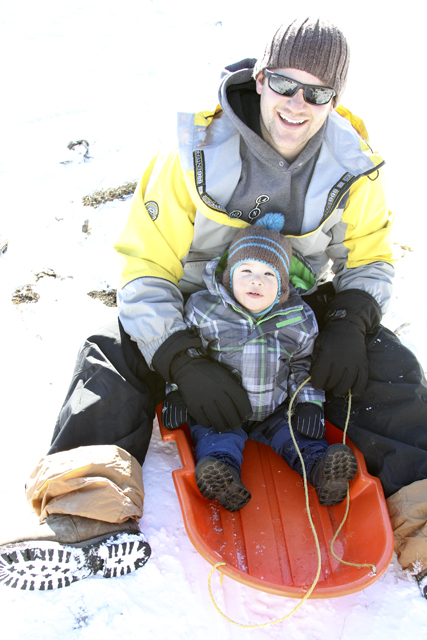 jc and daddy on the sled