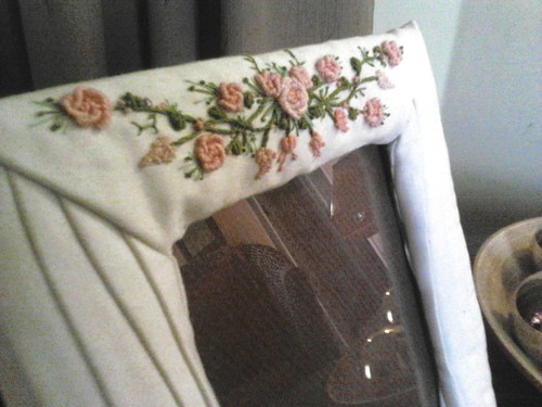 Embroidered fabric covered frame