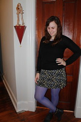 Purple outfit: purple tights, studded ankle boots, '90s mini skirt, cashmere sweater, grape necklace
