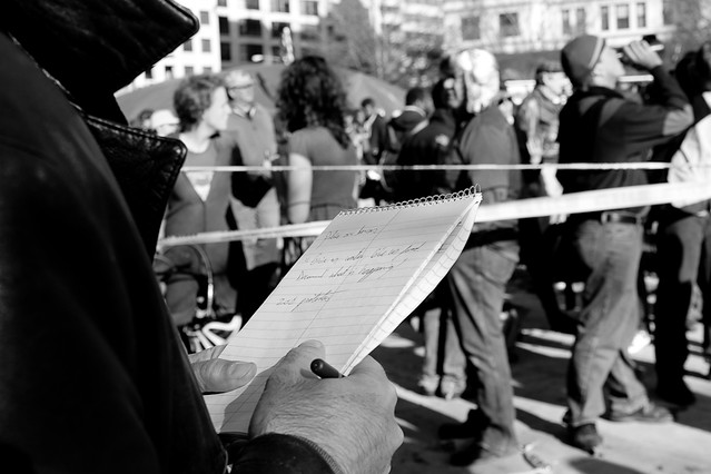 reporter at OccupyDC rally