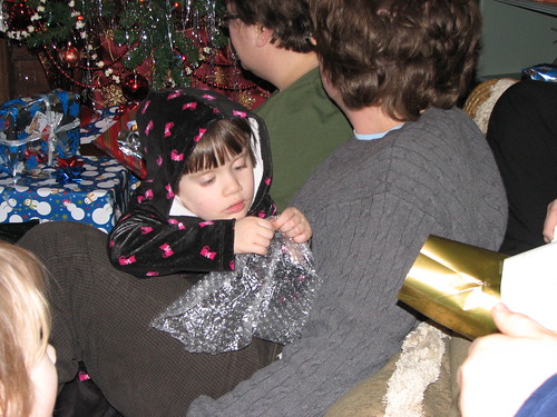 all those presents and she likes the bubble wrap best 