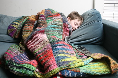 sleeping boy and blanket