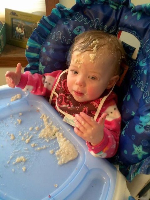 Lucy enjoying her oatmeal