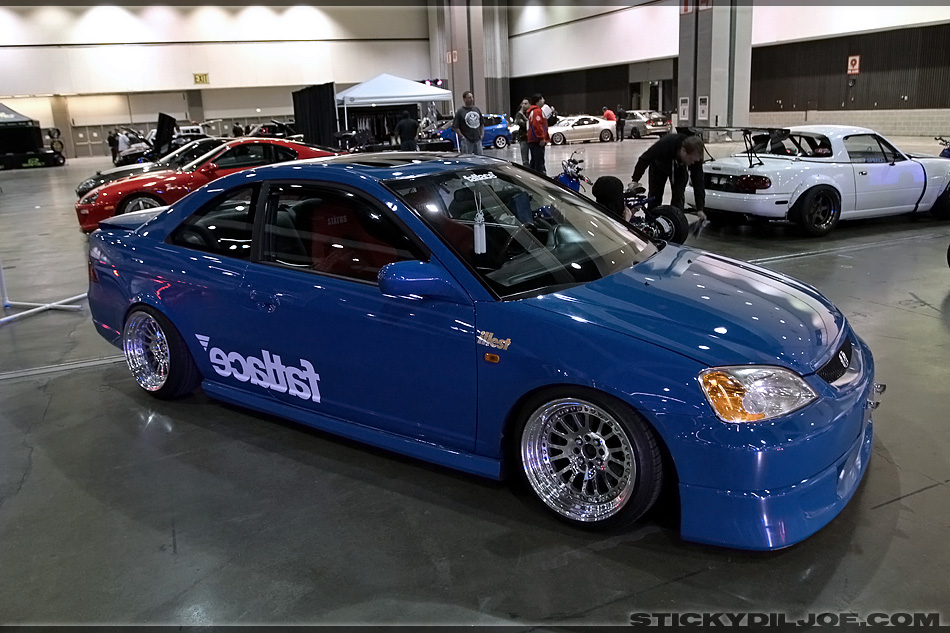 Carl's EM2 Civic at the Fatlace showcase area on some CCW wheels 