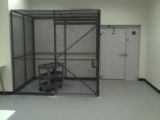 Security Cages help Secaucus Corporation Maintain inventory levels. by Gale's Industrial Supply