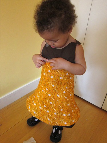 Ms. Z tries on her half-finished Tea Party Sundress.
