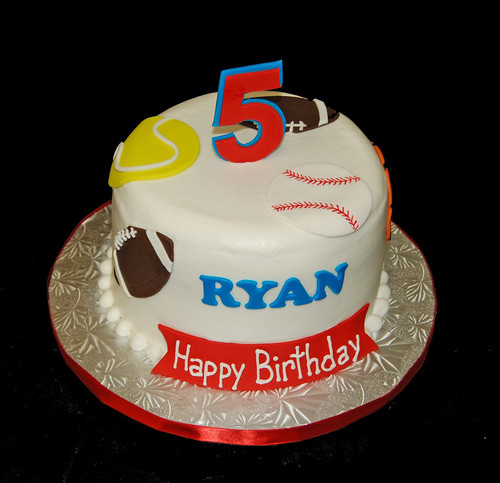 5th birthday sports themed cake - football, baseball, tennis, basketball