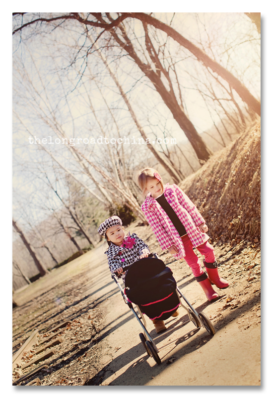 Two girls pushing the baby carriage BLOG