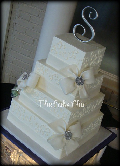 Bows and Bling Wedding cake Iced in buttercream with fondant sugar ribbon 