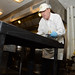 Dallas Tonsager, Under Secretary for Rural Development helps prepare the evening meal at the D.C. Central Kitchen