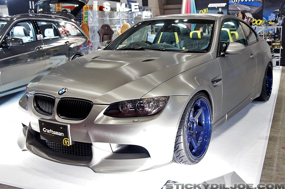 E92 BMW M3 with a matte brushed finish and blue Volk TE37 Super Laps 