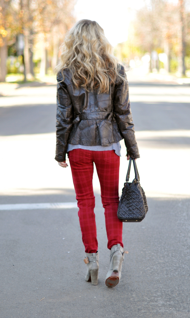 back of red jeans-big hair-patchwork leather jacket