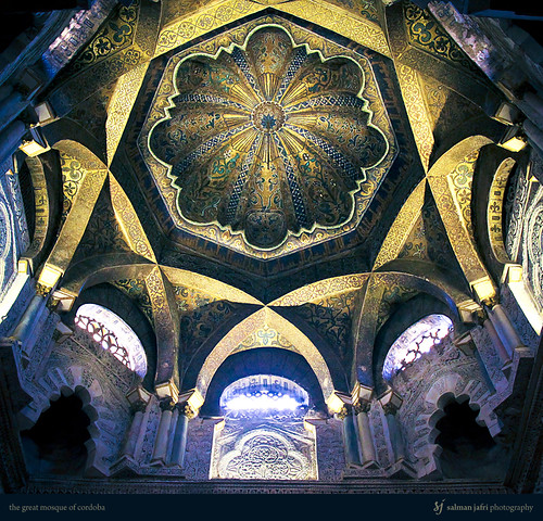 Dome of the Great Mosque of Cordoba, by Salman Jafri. A handful of predominantly Moorish features remain at the Great Mosque of Cordoba. Amongst them is the view one has of the dome that sits atop the mihrab (prayer chamber). I was able to borrow a friend's wide-angle lens and take this photo during the midday when light was entering through the designs.