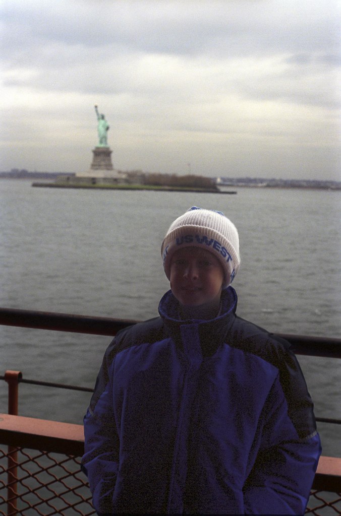 1990 12 Thede - Adam Thede Trip to New York City - 17 Adam Thede and the Statue of Liberty