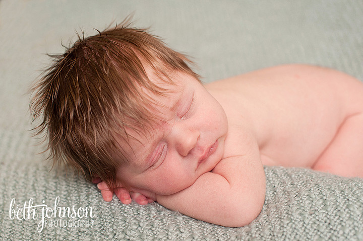 newborn baby boy with great hair tallahassee florida photographer